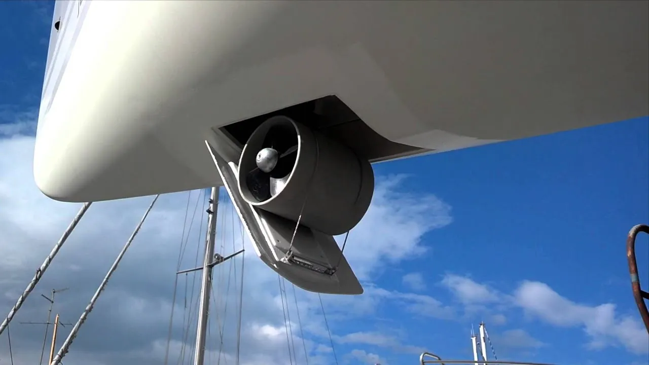 A still from Quick's video: a retractable thruster lowered from the hull of a boat on the hard, its propeller in the open tunnel.